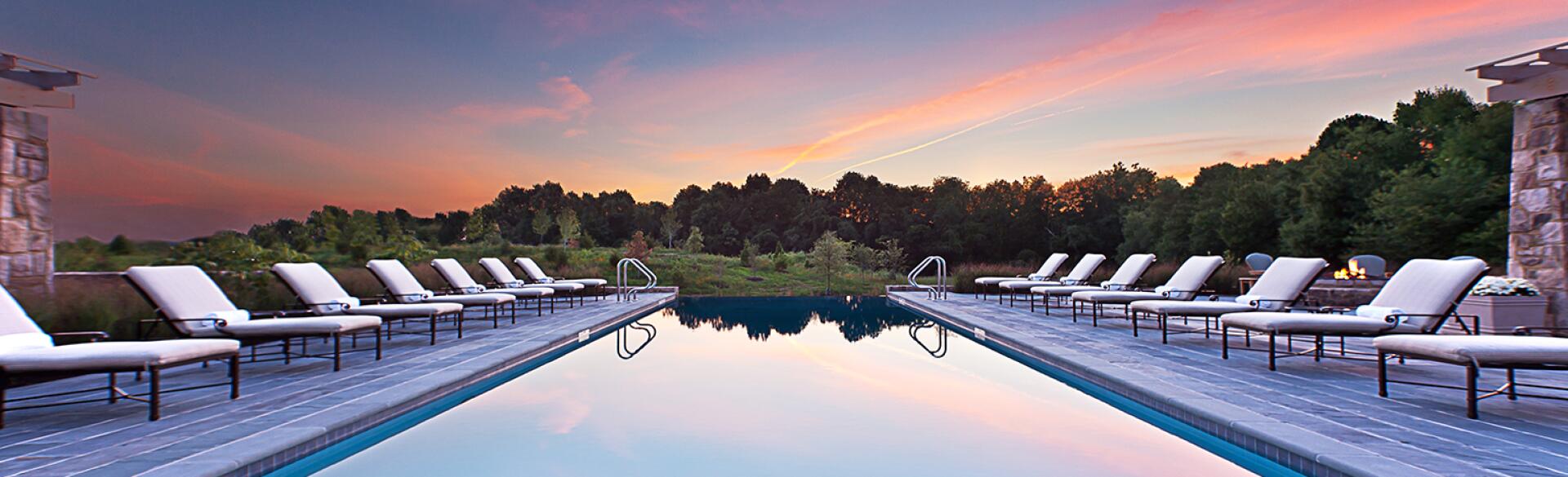 A photo of an in-ground pool at a luxury spa.