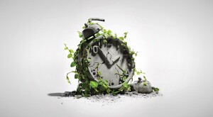A graphic of an old clock covered in ivy.