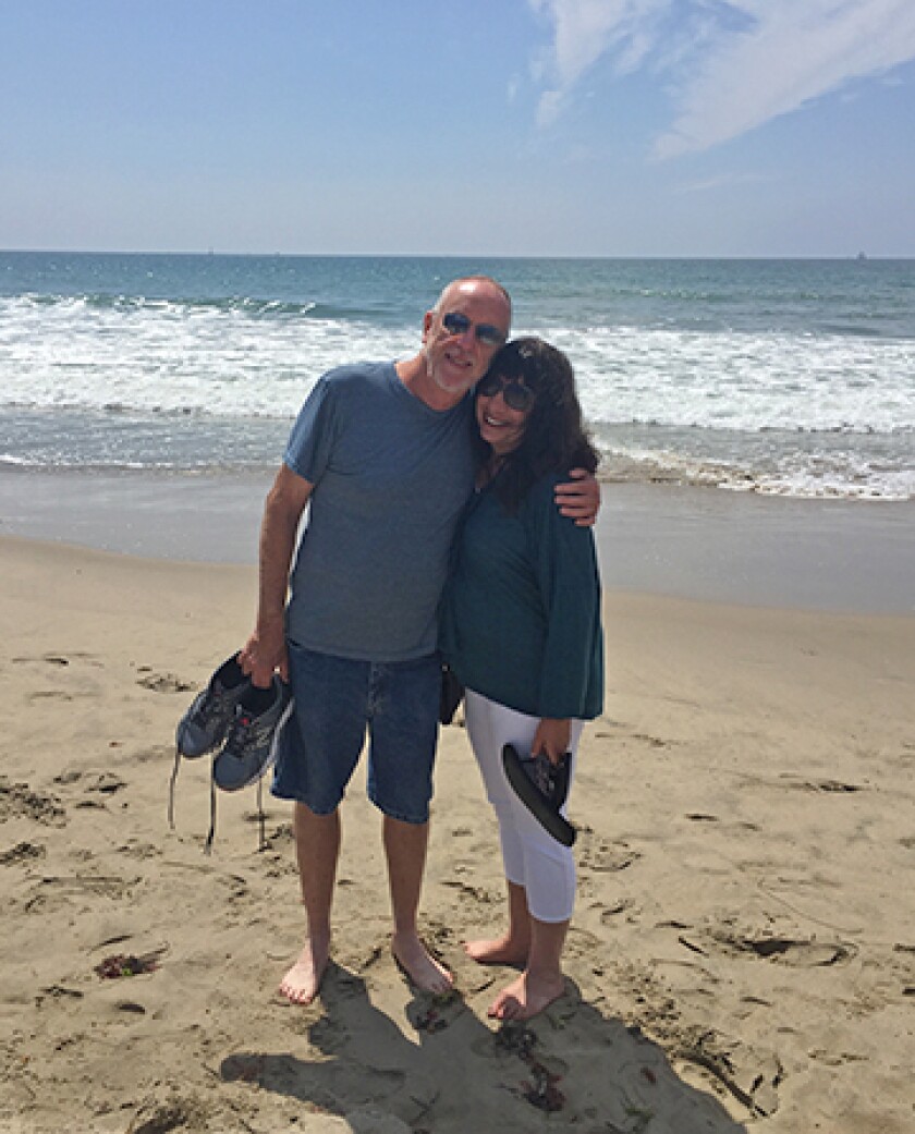 Ann Brenoff and her husband on the beach