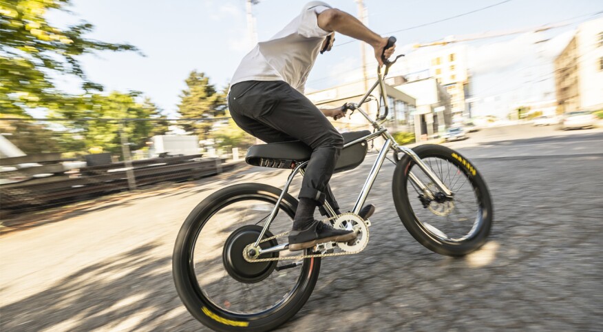 An eBike going fast in an urban landscape