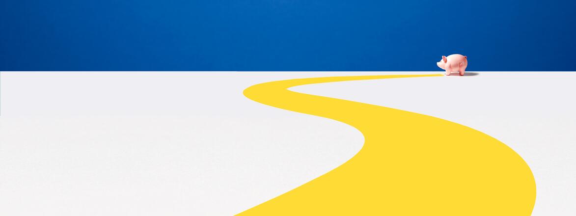 Piggy bank in front of blue and yellow background