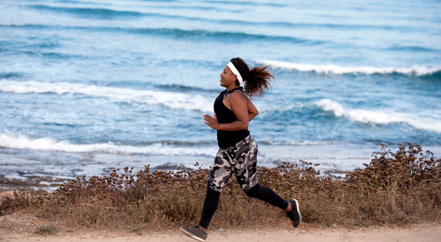 image_of_woman_running_on_beach_GettyImages-829536220_1800.png