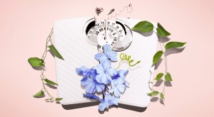 photo concept of broken weight scale with flowers and leaves sprouting from it