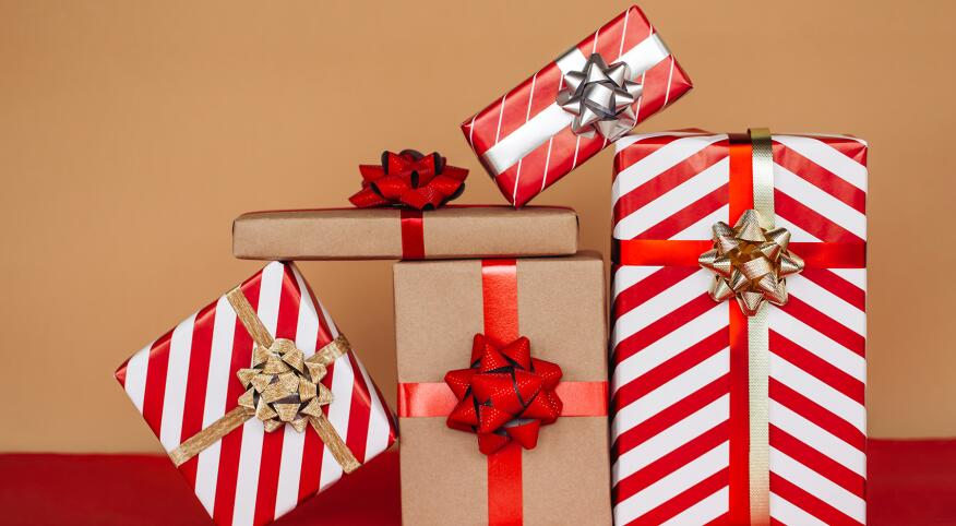image_of_wrapped_holiday_gifts_GettyImages-1269763466_1800