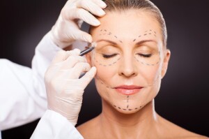 middle aged woman preparing for plastic surgery