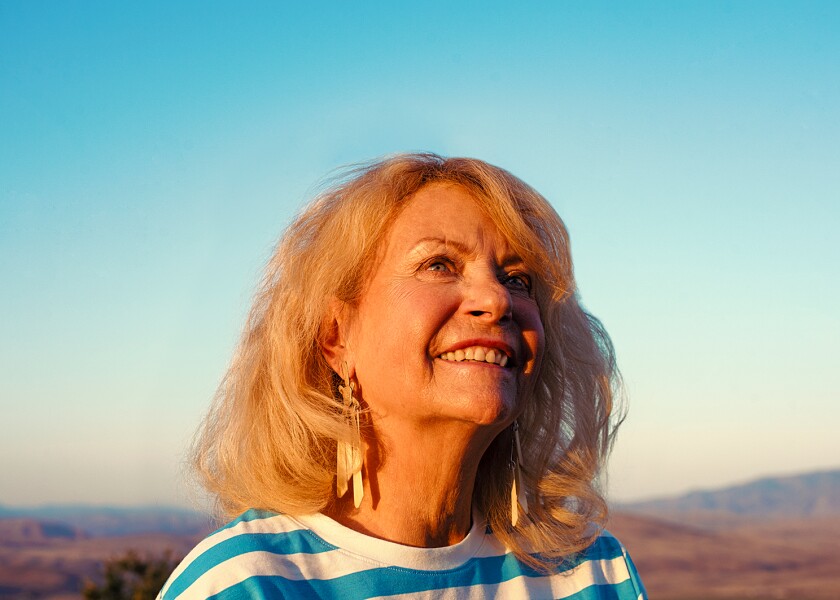 Babette Beatty outside of her home in Halfway, OR