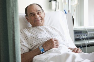 Older man in hospital bed
