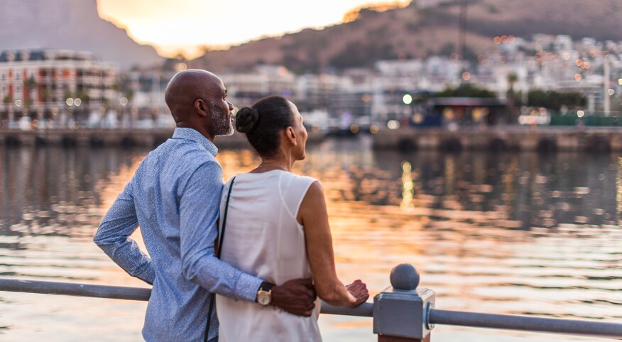 image_of_man_and_woman_from_behind_gazing_out_at_water_GettyImages-1234228119_1800