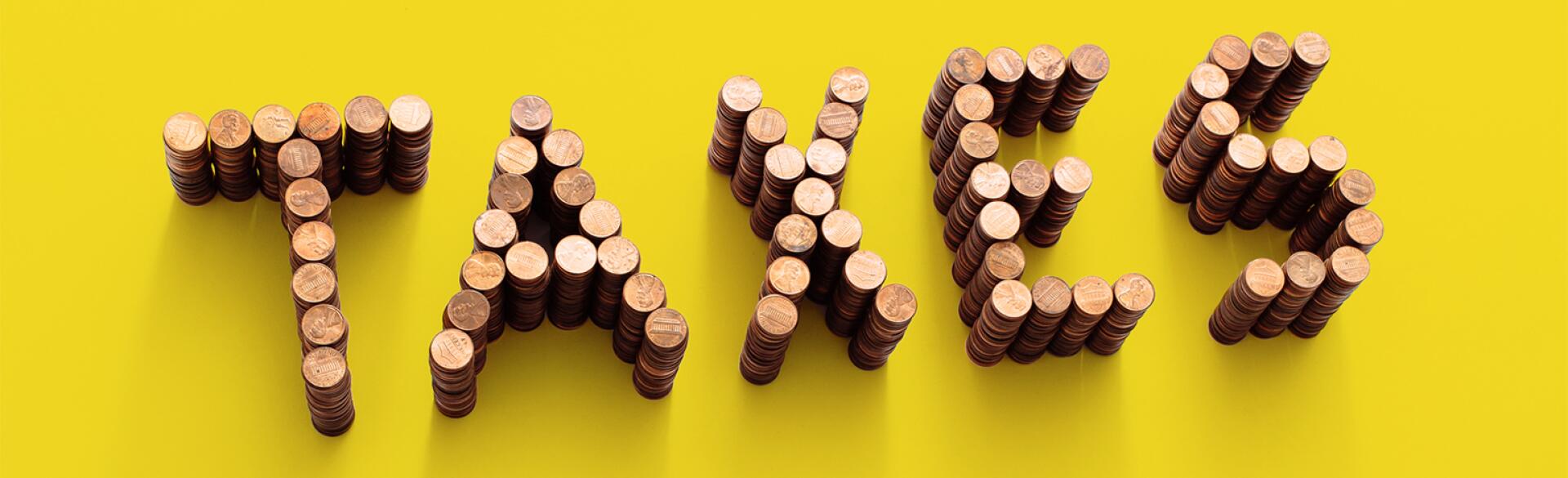 image_of_pennies_forming_the_word_taxes_1540x600