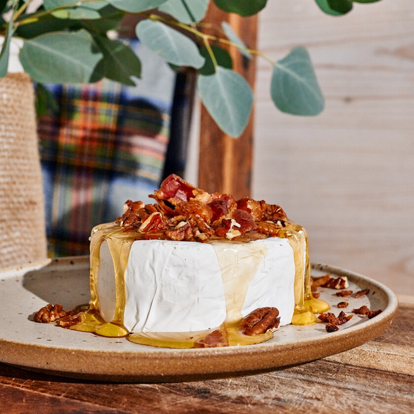 View of four easy appetizers with wintery plaid background