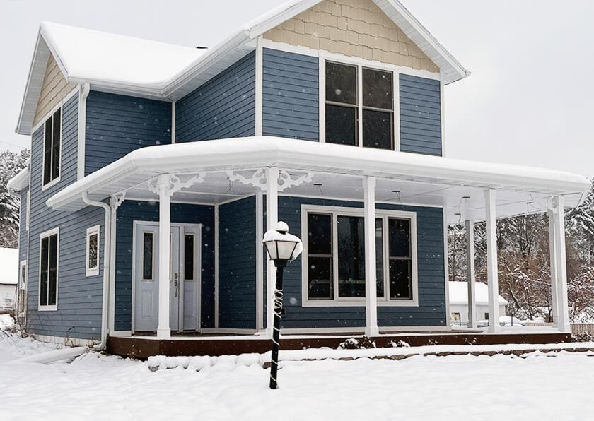 Fixer upper home in snow