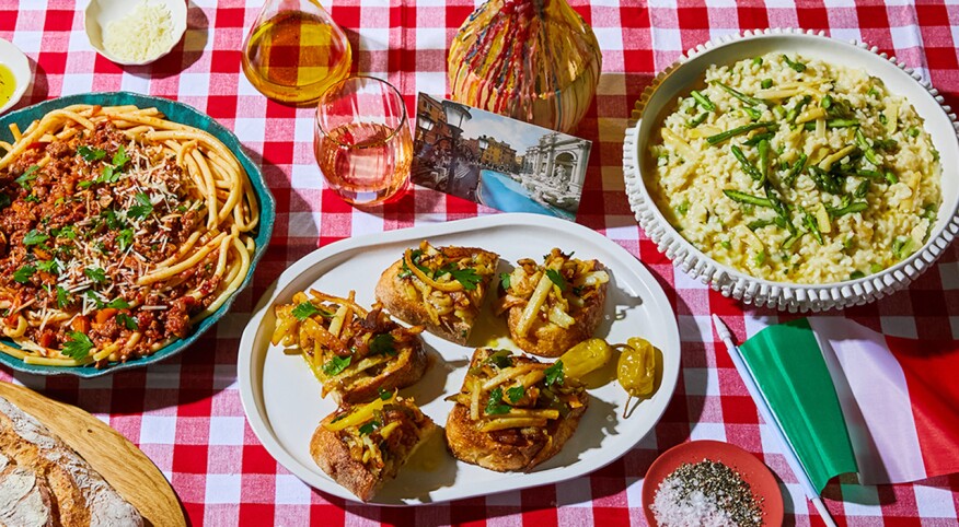 Bolognese, potatoes and peppers on bread and asparagus risotto with Italian flag