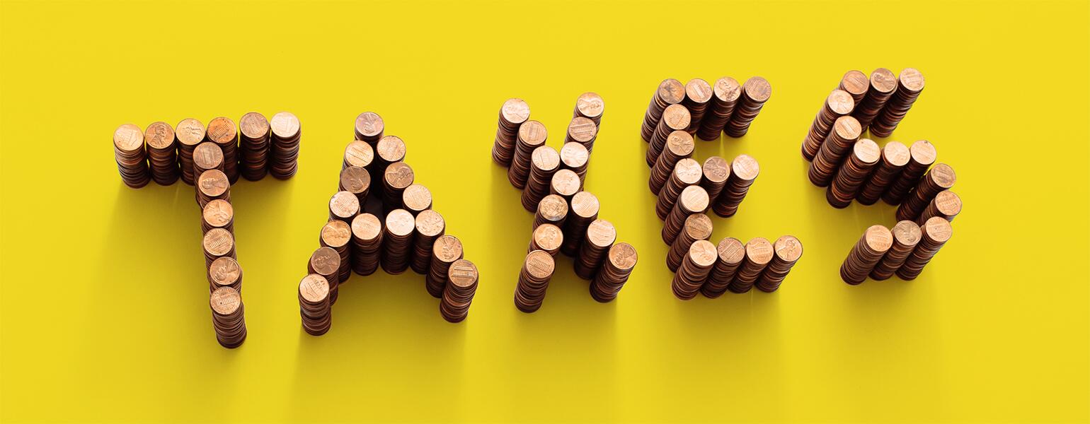 image_of_pennies_forming_the_word_taxes_1540x600