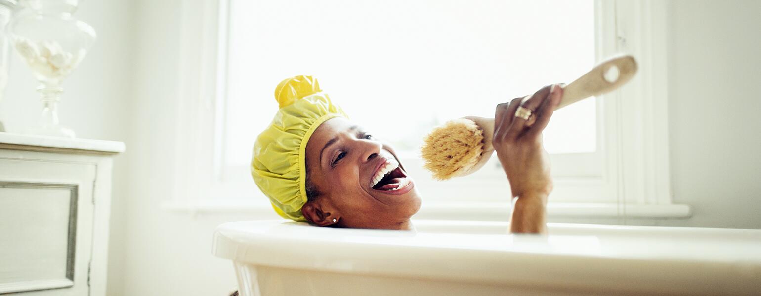 image_of_black_woman_in_bathub_with_shower_cap_GettyImages-639546321_1540.jpg