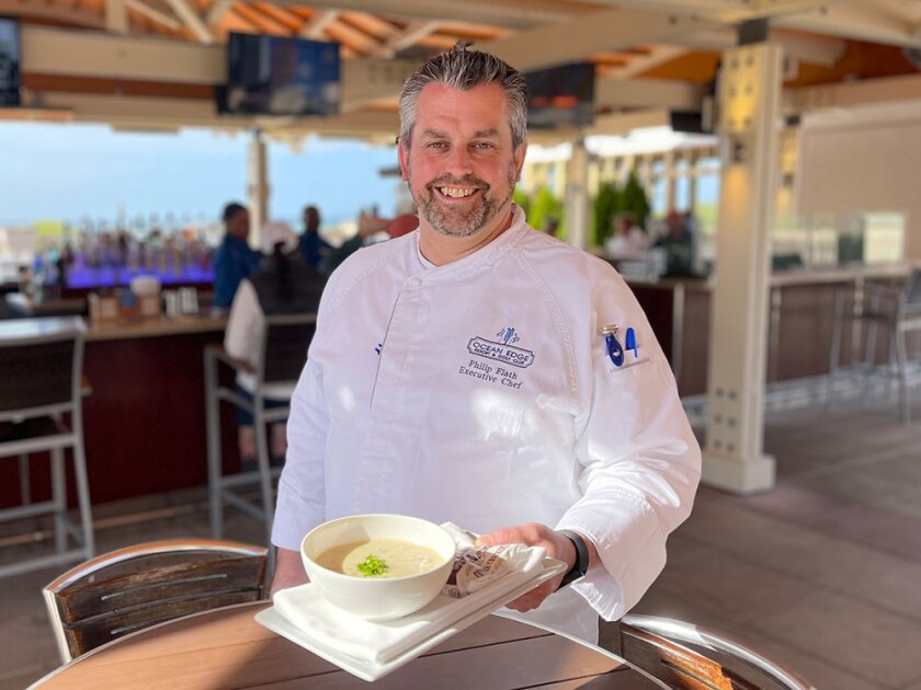 Ocean Edge Resort & Golf Club executive chef, Philip Flath, with a bowl of clam chowder