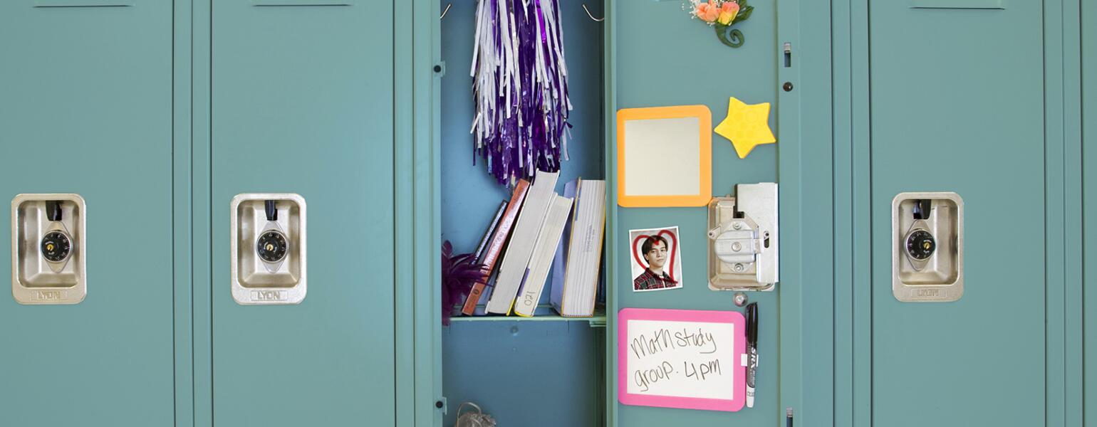 An image of an open high school locker.