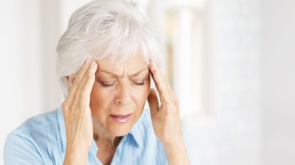 Senior Woman With Headache.