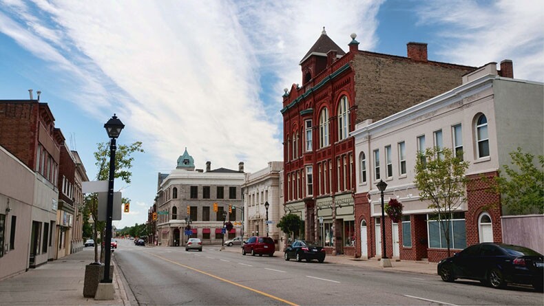 A street with buildings lining either side in Madison, Wisconsin,