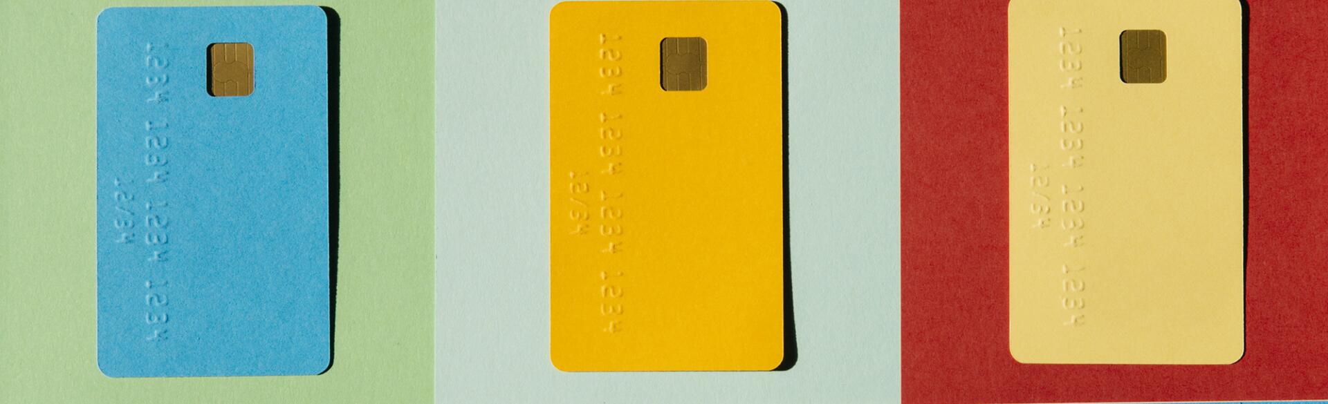 Colorful Credit Cards On Colorful Checked Background