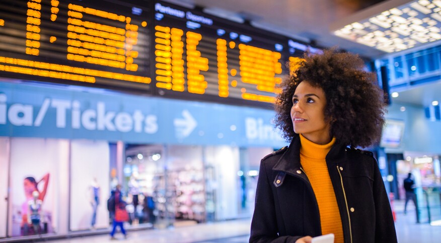 image_of_woman_in_airport_GettyImages-930011722_1800