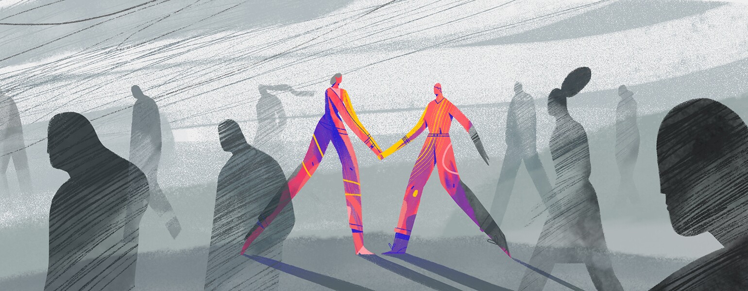 A graphic of two people holding hands together.