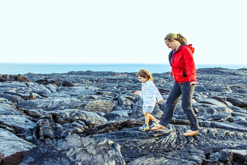 Child and mom explore Volcano Field, Volcano national park