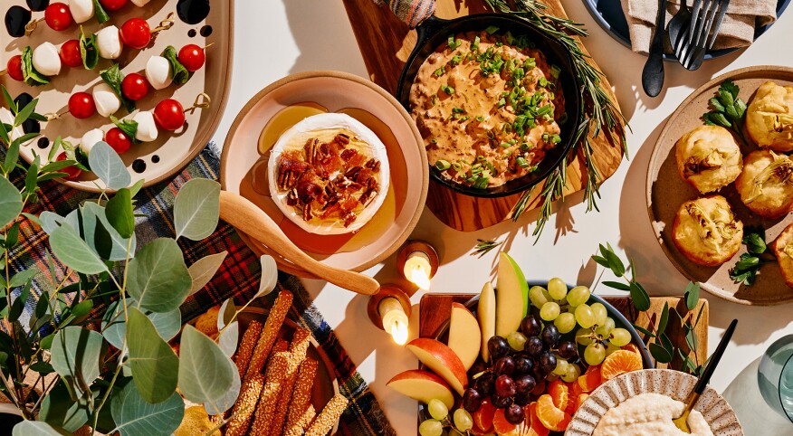 View of four easy appetizers with wintery plaid background