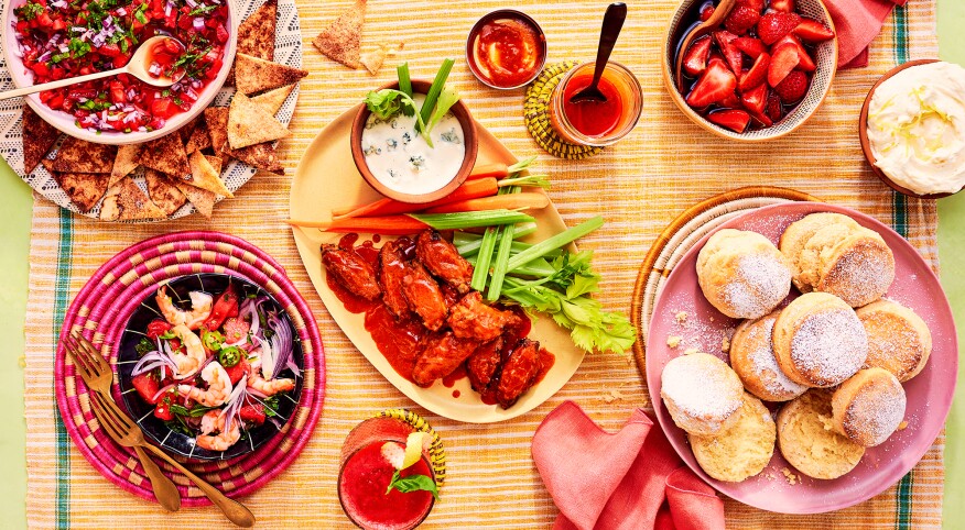 Red foods styled on a bright colored tablecloth