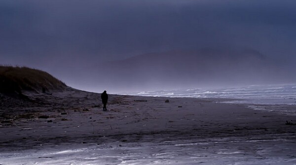 lonely man on beach