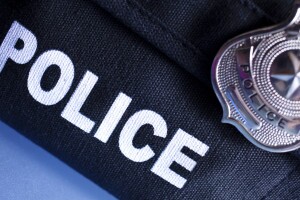 Police badge on vest