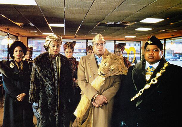 COMING TO AMERICA, from left, Sheila Johnson, Madge Sinclair, James Earl Jones, Paul Bates, 1988, ©P