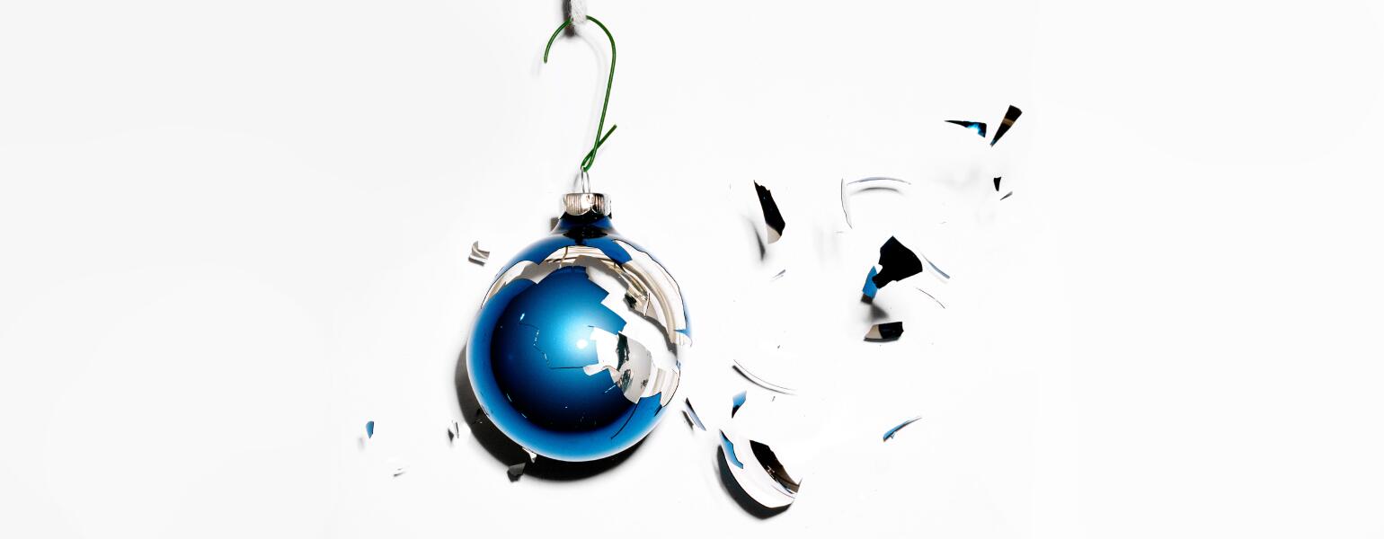 A smashed blue bulb Christmas ornament.