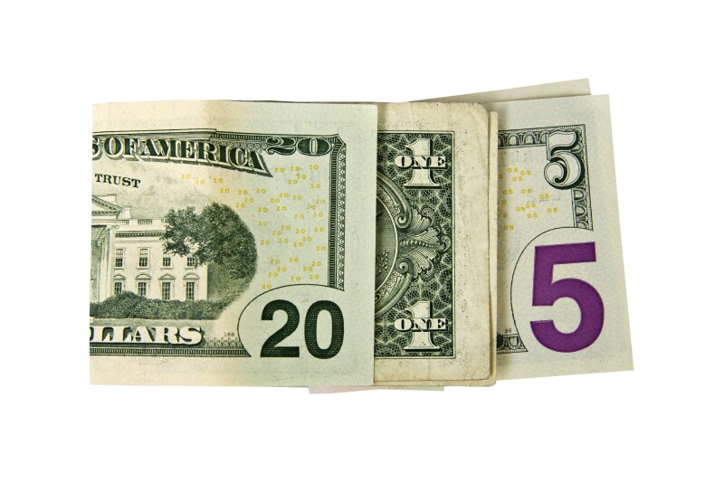 CLose up on 2015 written with dollars isolated on white background