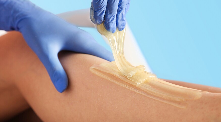 sugaring hair removal on legs
