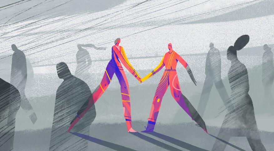 A graphic of two people holding hands together.