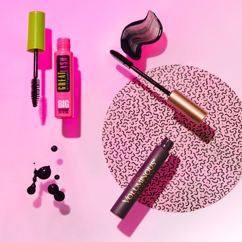 Makeup product on bright neon colored background