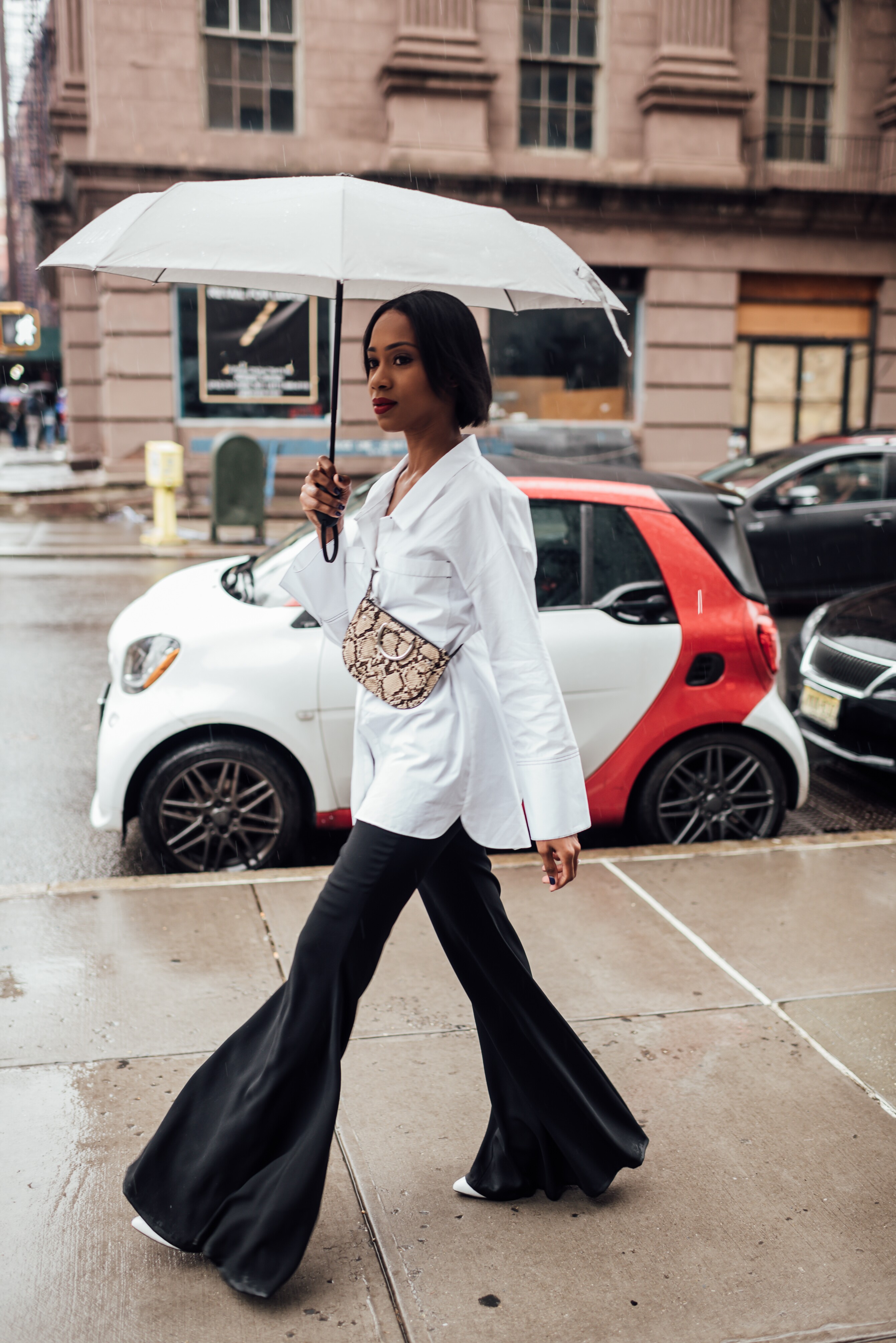 Woman Walking With Umbrella