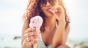 Black woman enjoying ice cream 