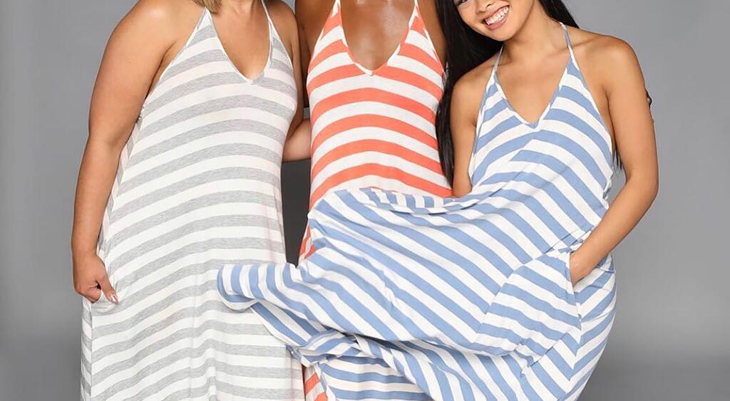 Tracy Nicole Clothing's Kate Halter dress, seen here on three models, from left in Grey Stripe, Melon Stripe and Denim Stripe