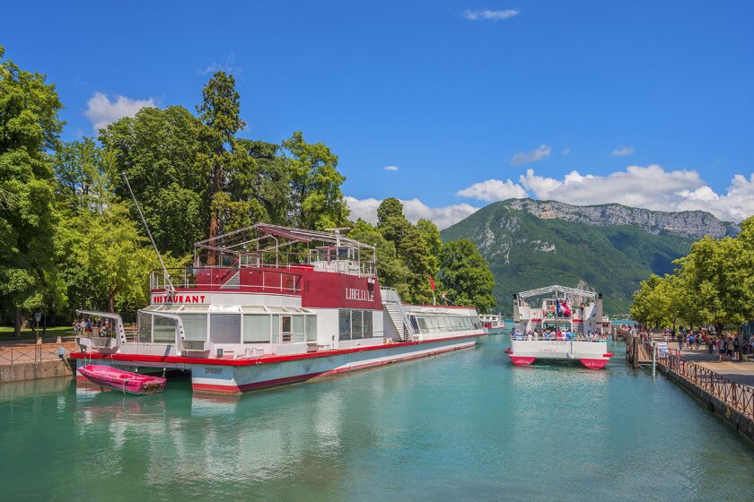 Tourist boats on the Thiou Canal on Lake Annecy in Annecy, France