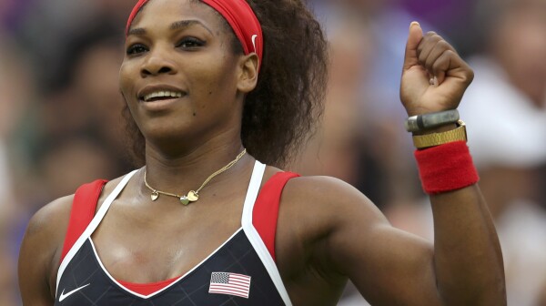 Serena Williams of the U.S. celebrates after defeating Russia's Zvonareva in their women's singles tennis match at the All England Lawn Tennis Club during the London 2012 Olympic Games