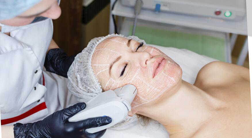 A photo of a woman undergoing an ultherapy treatment.
