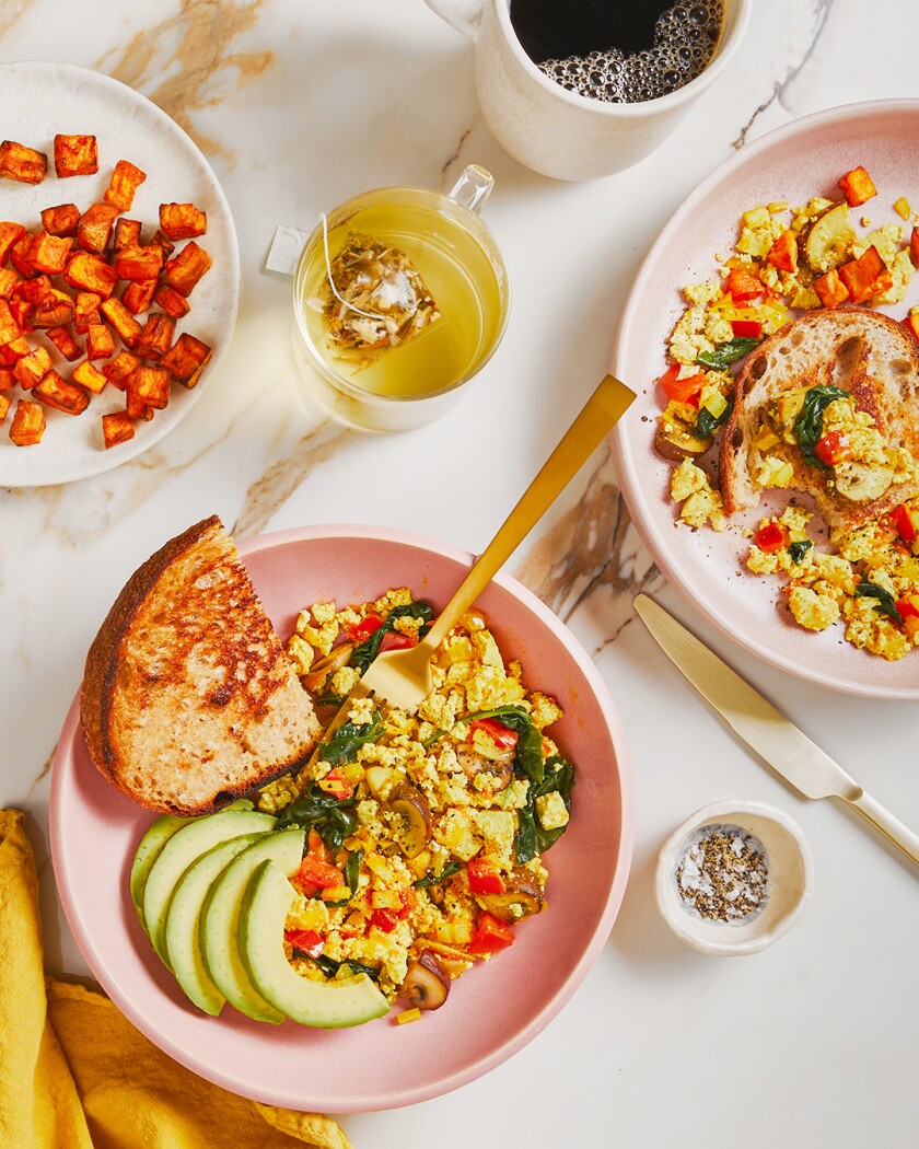 Breakfast meal styled on colorful surface