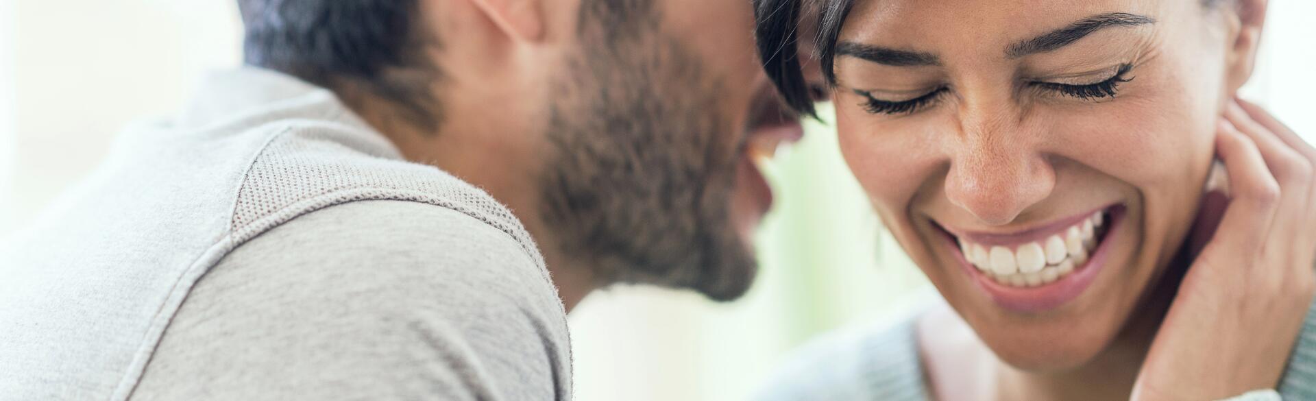 An image depicting a man over 40 speaking with a woman.