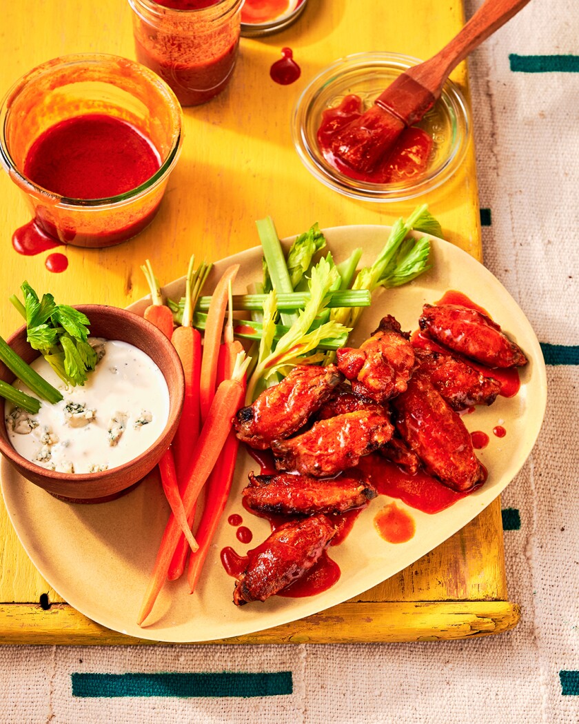 Red foods styled on a bright colored tablecloth