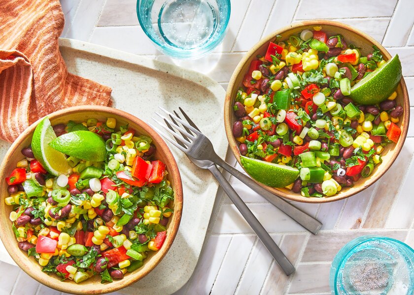 Summer salad arranged on tile surface