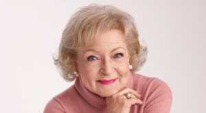 Portrait of Betty White in pink turtleneck