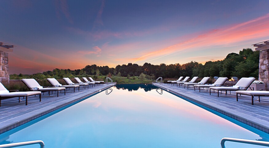 A photo of an in-ground pool at a luxury spa.