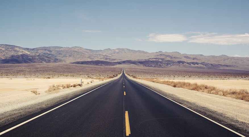 Empty road in the desert representing loneliness. 