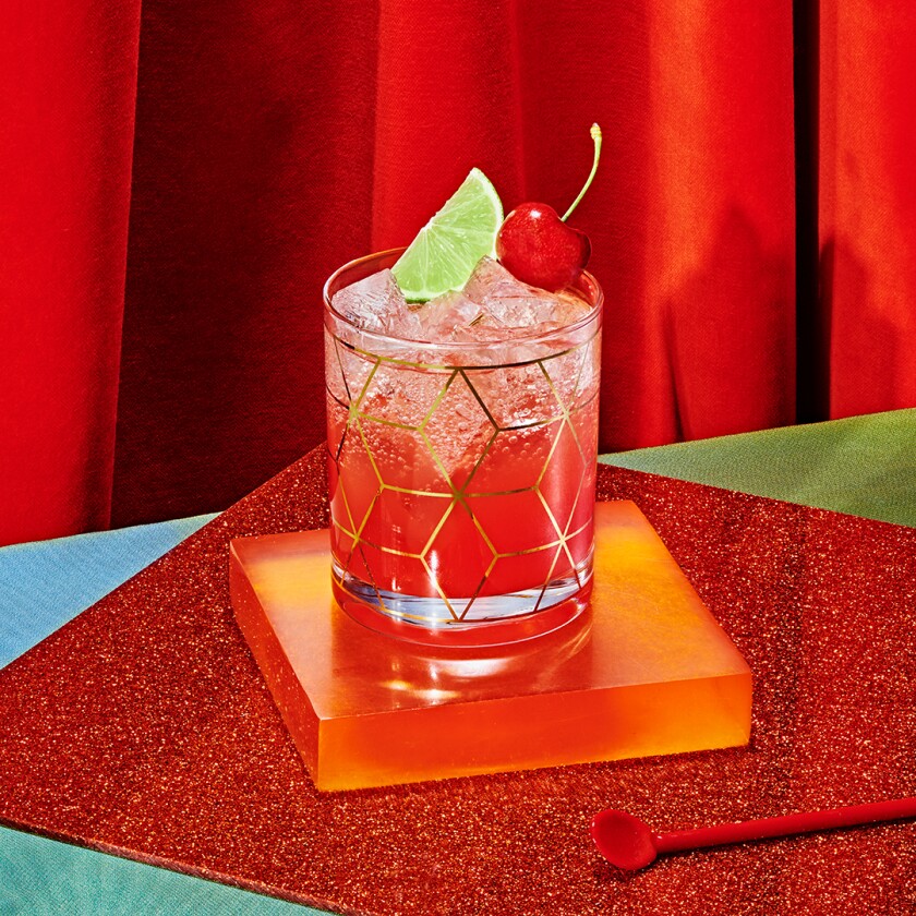 Beautiful Shirley Ginger mocktail photographed on red